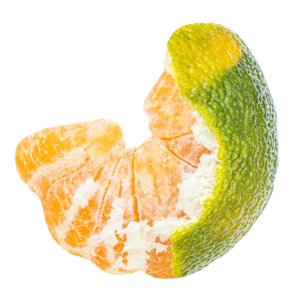 Peeled Tangerine, clementine, mandarines fruit isolated on white background. Macro