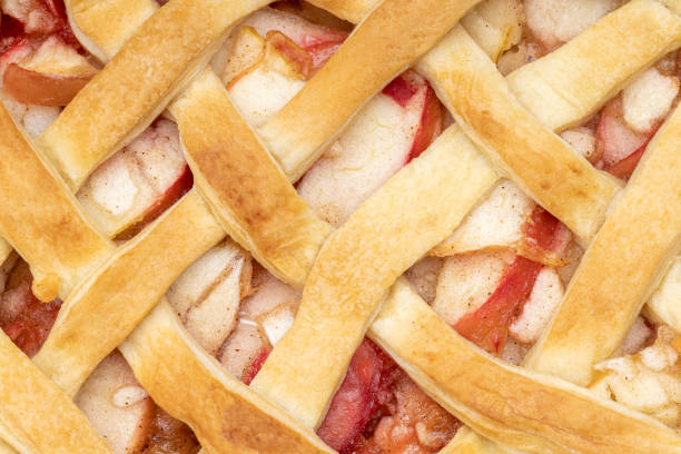 istock close up latticed american apple pie above view. background backdrop. studio shot. fresh traditional fruit pie 1285875407