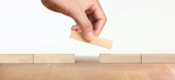 istock Hand arranging wood block . Business concept growth success 1285876197