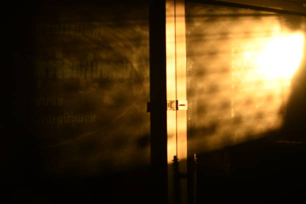 istock orange ray of sun ligth on the mirror 1285876419