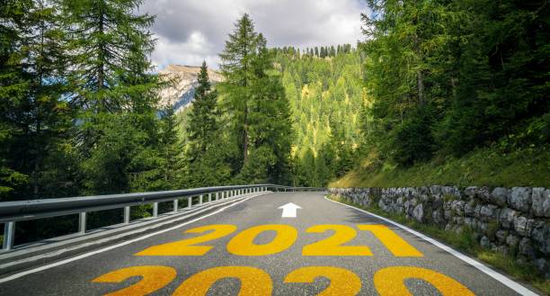 istock 2021 New Year road trip travel and future vision concept . 1285877993