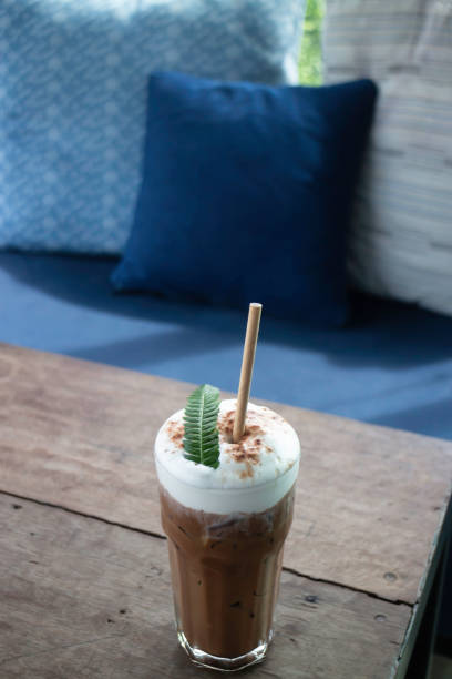 istock Coffee glass decorated with fern leaf 1285881048