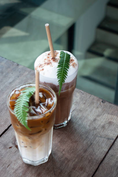 istock Coffee glass decorated with fern leaf 1285881051