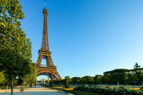 istock Architectural details of the Eiffel Tower at sunrise against a clear blue sky 1285885982