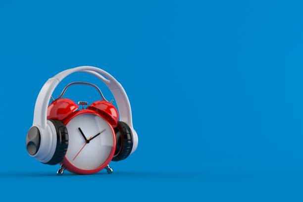 istock Alarm clock with headphones 1285885988