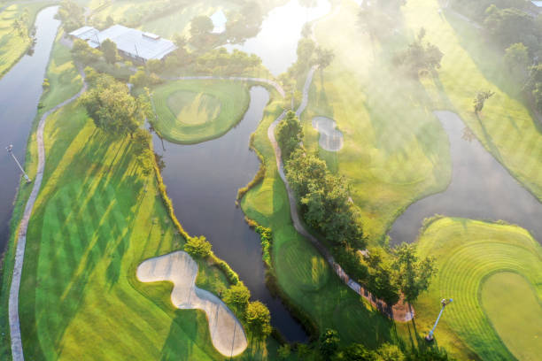 istock Aerial view Green Golf course in the morning. 1285886972