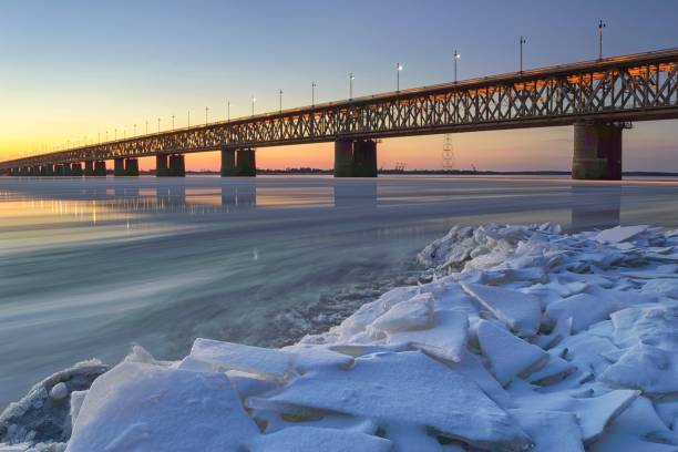 istock Ice drift on the Amur river. Amur bridge. Trans siberian railway. 1285889504