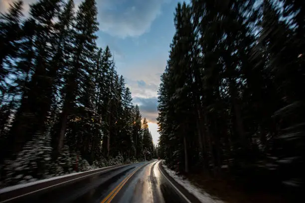 Driving through Yellowstone National Park at Sunset in Winter