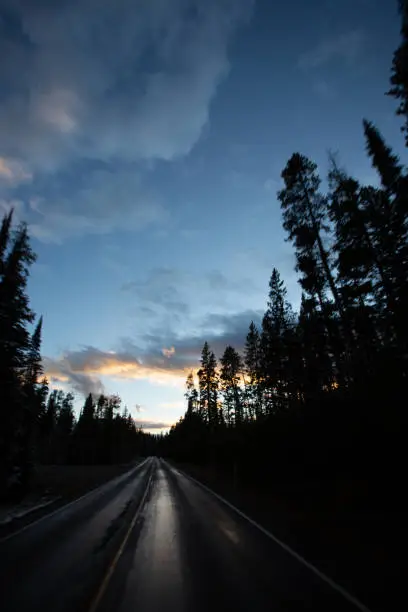 Driving through Yellowstone National Park at Sunset in Winter