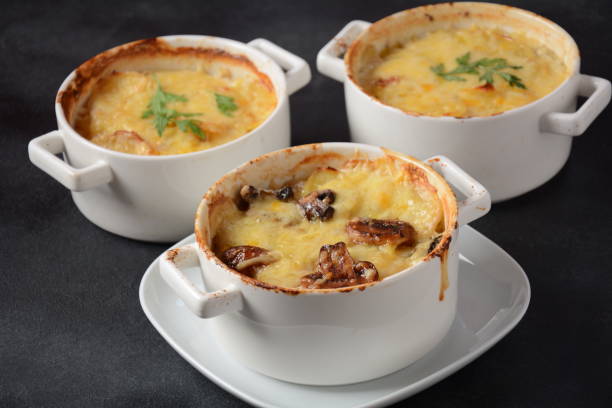 istock Potato gratin with mushrooms in baking cocottes 1285890514