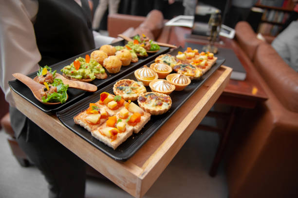 istock assorted of delicious canepes on tray 1285893108