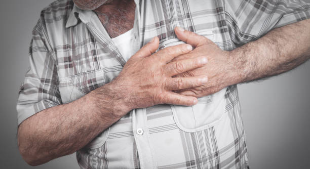 istock Man holding his chest suffering from heart attack. 1285894359