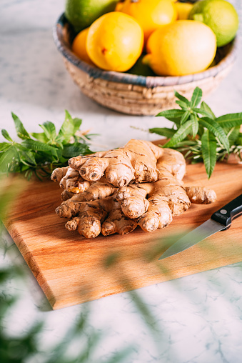 Fresh Ginger Root on Cutting Board
