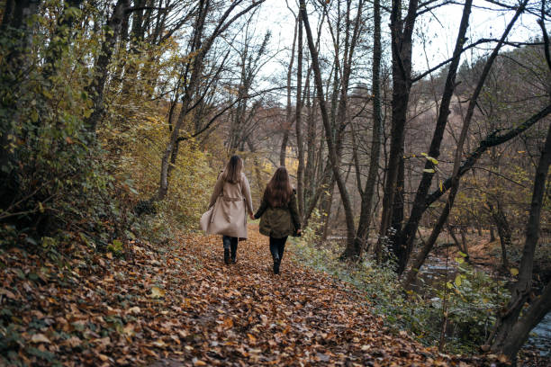 istock Young girls in the autumn walk 1285896120