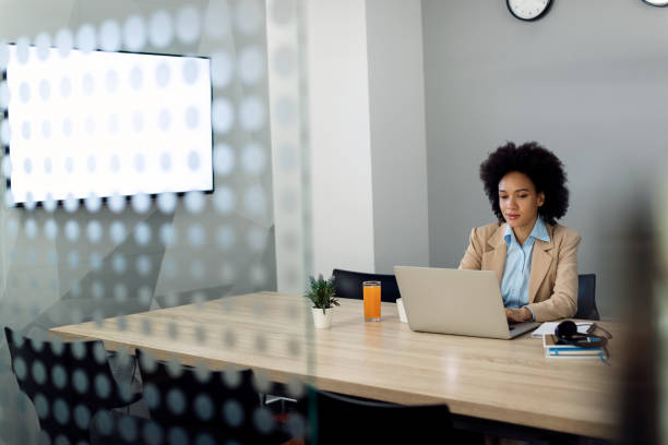 istock African American businesswoman working on a computer in the office. 1285896145