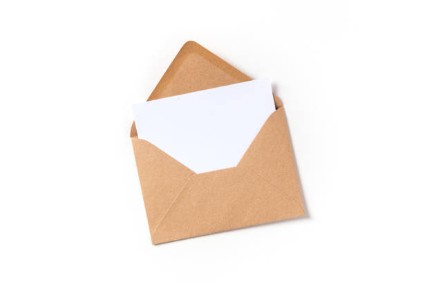 Greeting card in a brown kraft envelope mockup, shot from above on a white background Greeting card in a brown kraft envelope mockup, shot from above on a white background with a place for text cervical vertebrae photos stock pictures, royalty-free photos & images