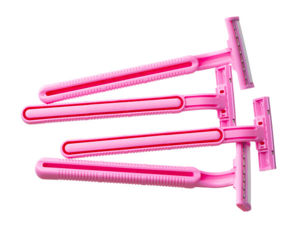 istock Female pink razor shaver isolated on white background 1285896165