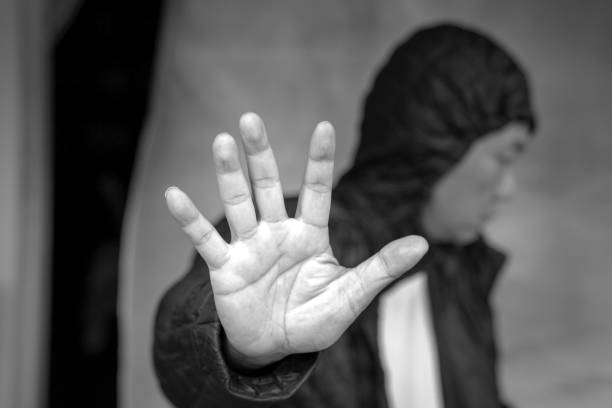 istock Mental health concept. Depressed man waving hand to push away or refuse help. 1285898903