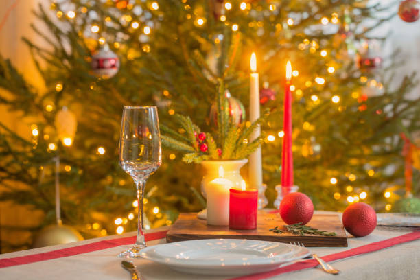 istock Christmas table with candles on background fir 1285900287