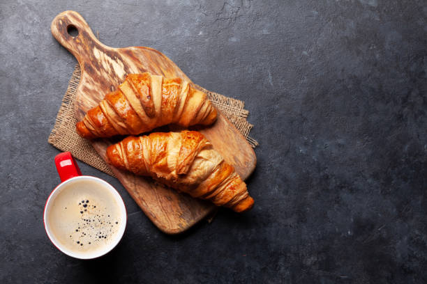 istock Espresso coffee and croissants for breakfast 1285902626