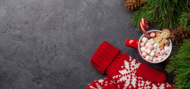 istock Christmas card with fir tree and cup with marshmallow 1285902820