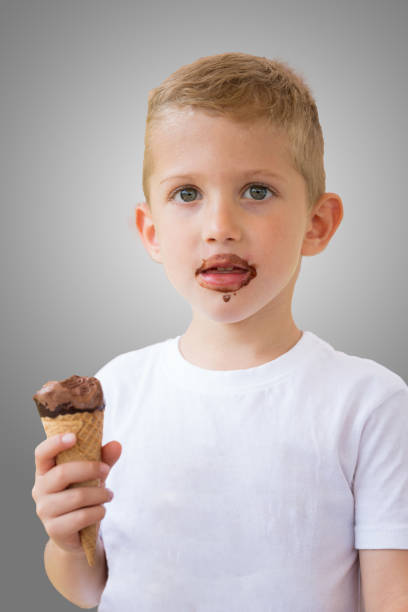 istock Child boy ready for eating chocolate ice cream 1285903087