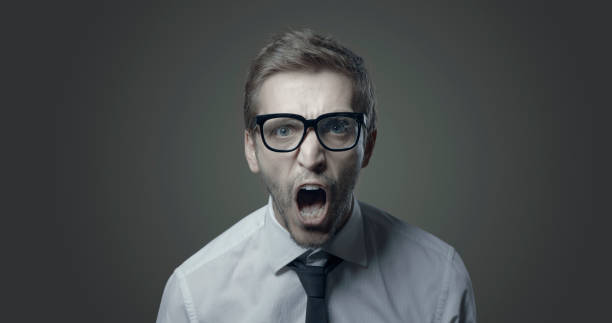 istock Angry aggressive businessman shouting at camera 1285905688