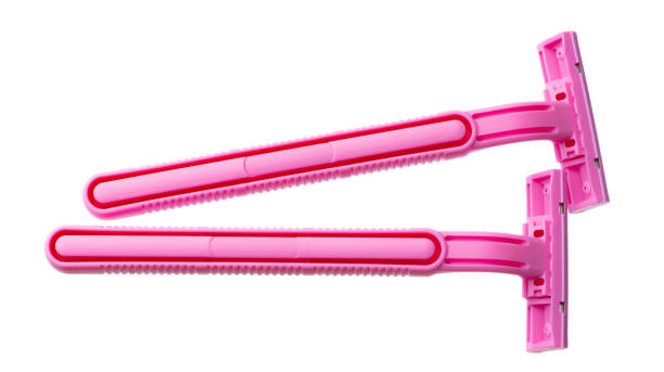 istock Female pink razor shaver isolated on white background 1285911004