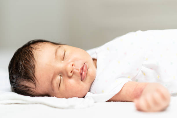 istock Sleeping newborn baby girl 1285914442