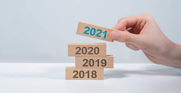 istock Domino New year 2021 wood-material container, domino effect 1285914936