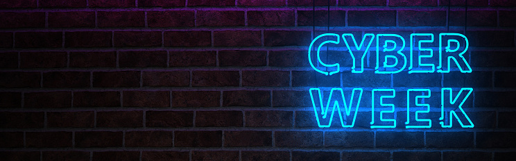 Neon sign Cyber Week on the brick wall. 3d illustration.