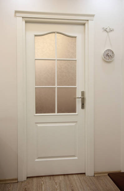 istock New and wooden interior door 1285917873