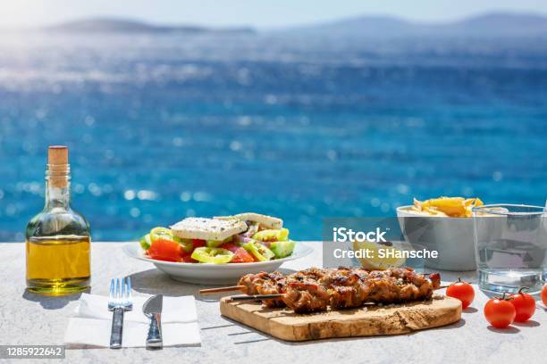 Greek Food Concept With A Farmers Salad In Front Of The Aegean Sea Stock Photo - Download Image Now