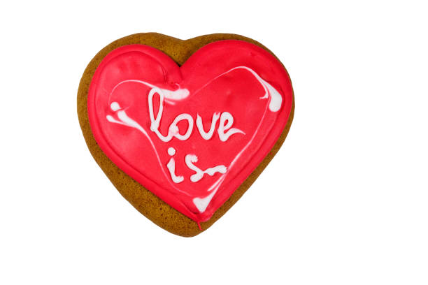 istock Heart shaped gingerbread cookie isolated on white background 1285924568