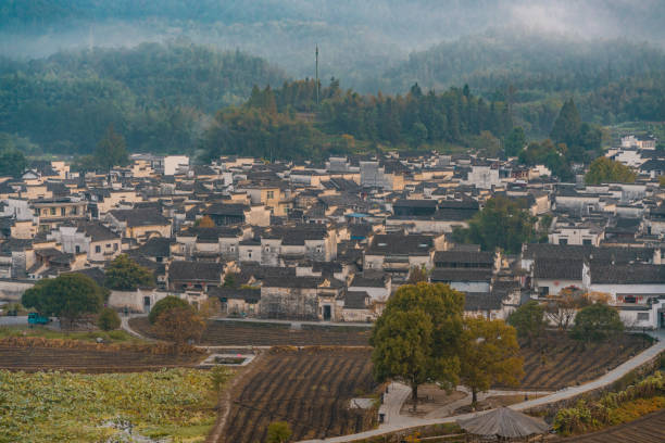 istock Xidi village at sunrise 1285925648