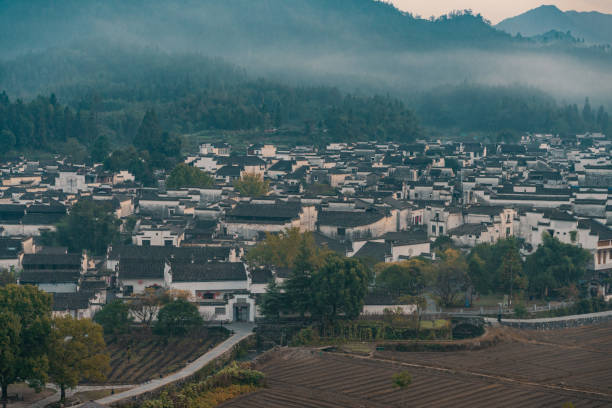istock Xidi village at sunrise 1285925711