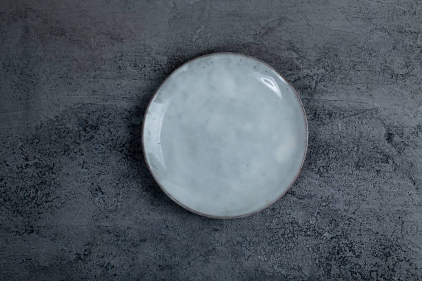 istock Vintage Rustic Plate on beautiful Stone textured background. Minimalist Style. Template for Poster Banner Cooking Baking Workshop Course 1285925985