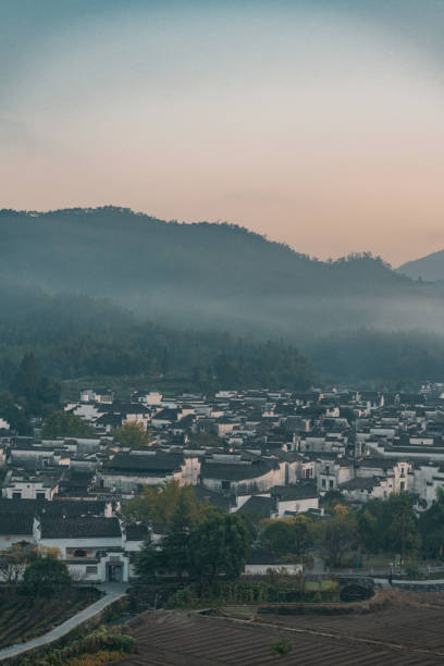 istock Xidi village at sunrise 1285926218
