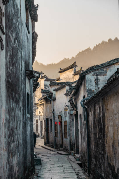 istock Xidi village at sunrise 1285926500