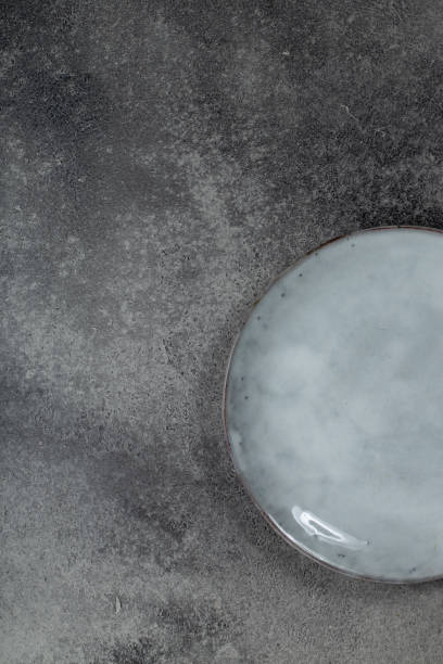 istock Vintage Rustic Plate on beautiful Stone textured background. Minimalist Style. Template for Poster Banner Cooking Baking Workshop Course 1285926594