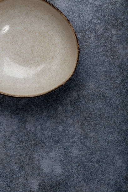 istock Vintage Rustic Plate on beautiful Stone textured background. Minimalist Style. Template for Poster Banner Cooking Baking Workshop Course 1285927549