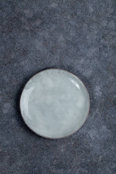 istock Vintage Rustic Plate on beautiful Stone textured background. Minimalist Style. Template for Poster Banner Cooking Baking Workshop Course 1285927652