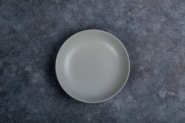 istock Vintage Rustic Plate on beautiful Stone textured background. Minimalist Style. Template for Poster Banner Cooking Baking Workshop Course 1285927932