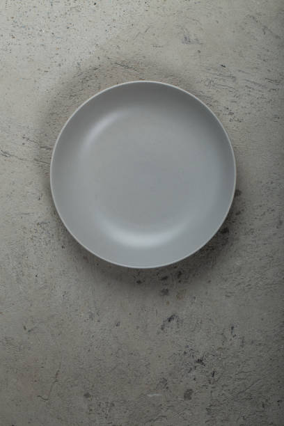 istock Vintage Rustic Plate on beautiful Stone textured background. Minimalist Style. Template for Poster Banner Cooking Baking Workshop Course 1285928738
