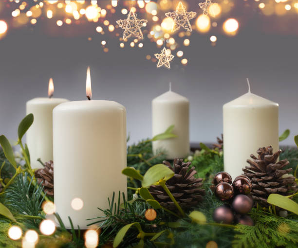 istock Two burning candle in advent season 1285929182