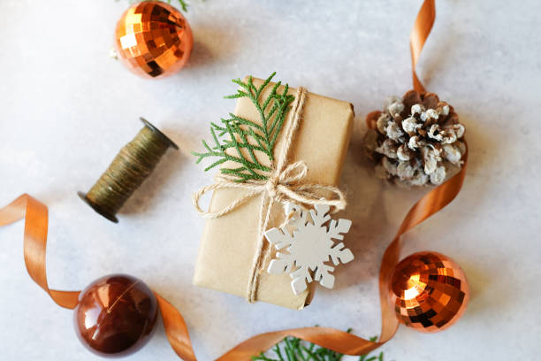 istock Christmas background. Christmas present wrapping over gray table. Creative Flat layout and top view composition 1285931113