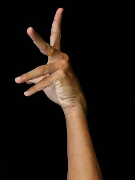 istock closeup view of human hand isolated on black background 1285932403