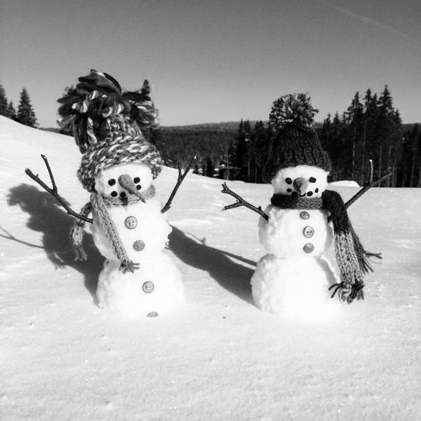 istock Handmade Snowman family, team 1285933781