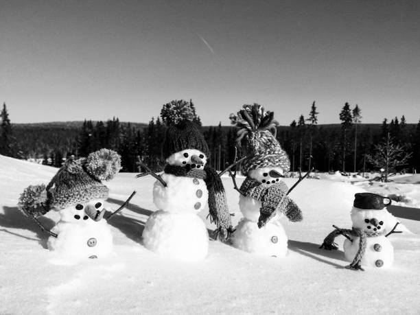 istock Handmade Snowman family, team 1285933827