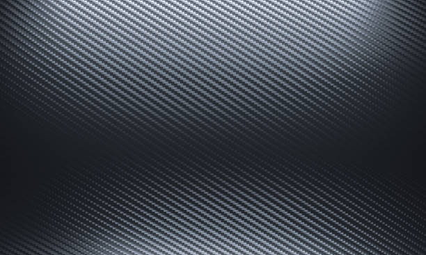 istock carbon fiber background in black shades. 1285934374